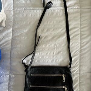 Compact Black Crossbody Bag with Adjustable Strap